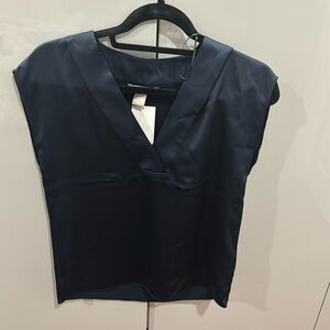 Navy blue H&M blouse with a V neck.
